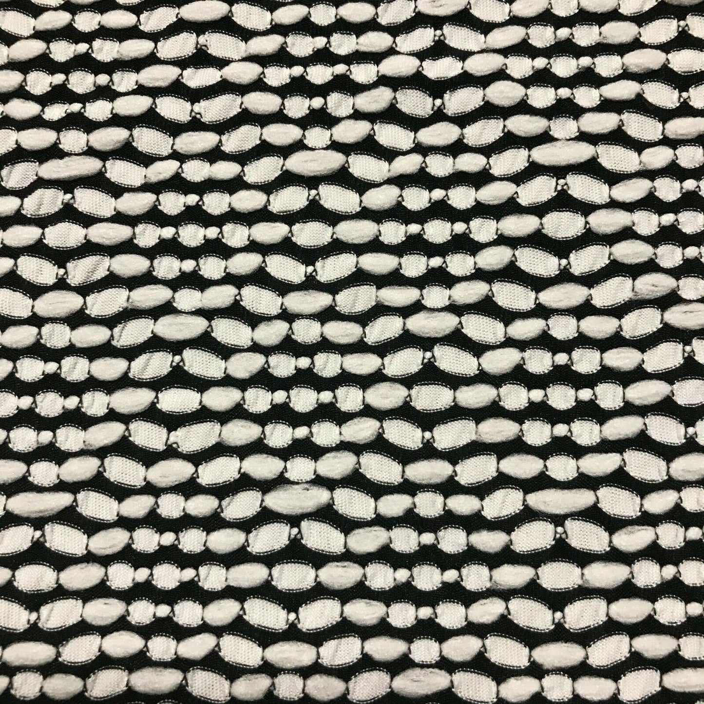 STRETCH JERSEY FABRIC BLACK AND WHITE SPOTTED RHOMB FIGURED - SOLD BY THE METRE