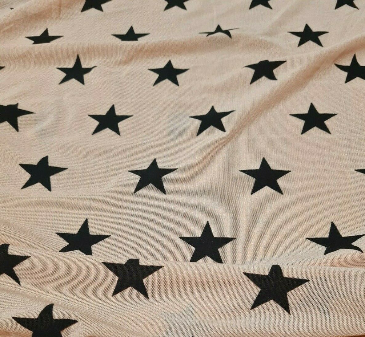 STRETCH TULLE FABRIC BLACK FLOCKED STAR PRINTED PEACH COLOUR NET-SOLD BY METRE