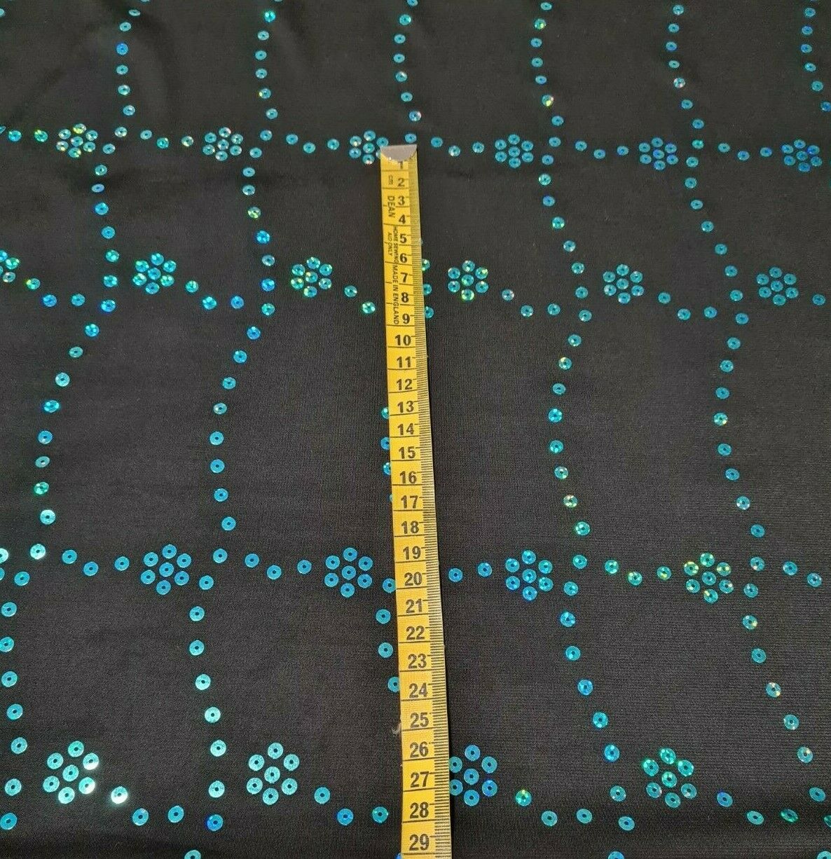 JERSEY LYCRA FABRIC BLUE SEQUIN BLACK STRETCH - SOLD BY METRE