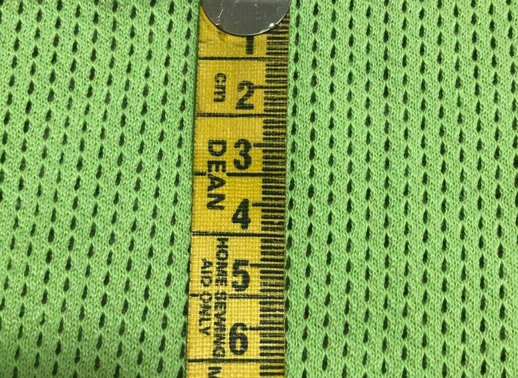 GREEN PERFORARED COTTON JERSEY FABRIC - SOLD BY THE METRE