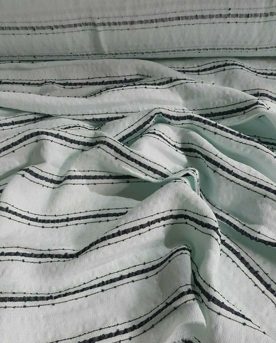 SPOTTED VISCOSE FABRIC SMALL BUMPY -4 COLOUR-SOLD BY THE METER