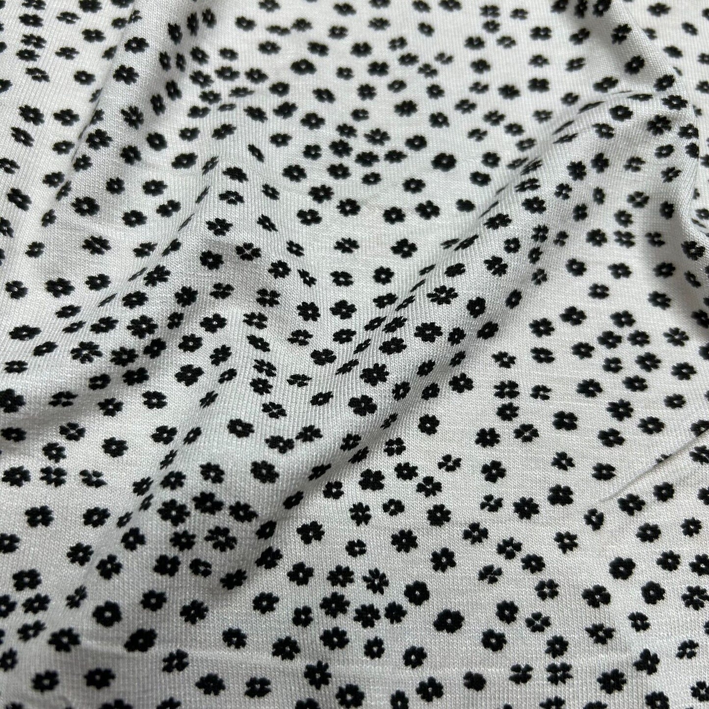 Viscose Jersey Fabric White And Black Floral Printed 4 Way Stretch 55" Wide