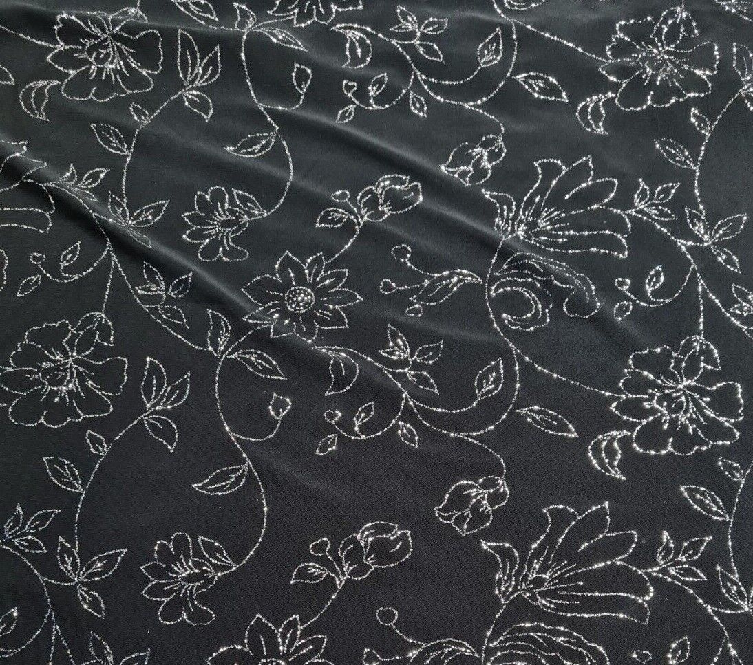 Shiny Jersey Fabric Silver Glitter Floral Black Colour 55" Wide 2 Way Stretch