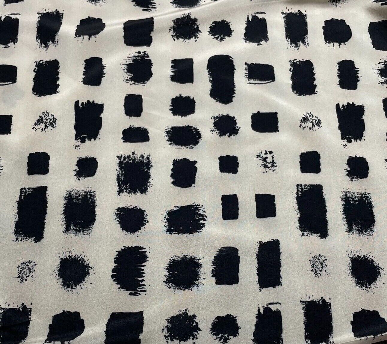 Crepe Fabric Black Printed Ivory Colour 55"