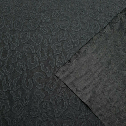 Dressmaking Knit Fabric Black Animal Figured 4 Way Stretch 55" Wide A1-211