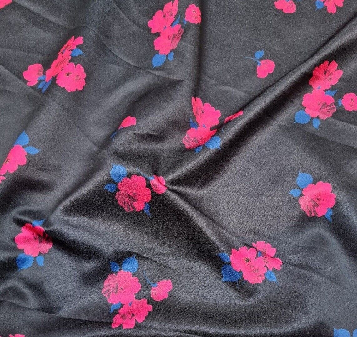 Satin Textured Dressmaking Fabric Fuchsia And Blue Floral Printed Black Colour