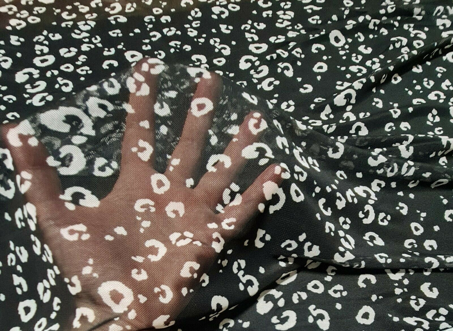 STRETCH NET TULLE FABRIC BLACK AND OFF WHITE LEOPARD PRINTED SOLD BY THE METRE