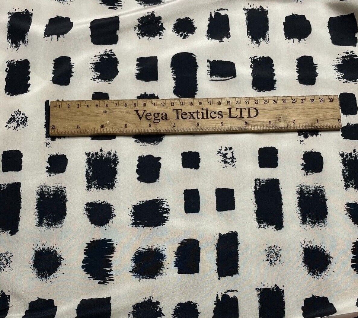 Crepe Fabric Black Printed Ivory Colour 55"