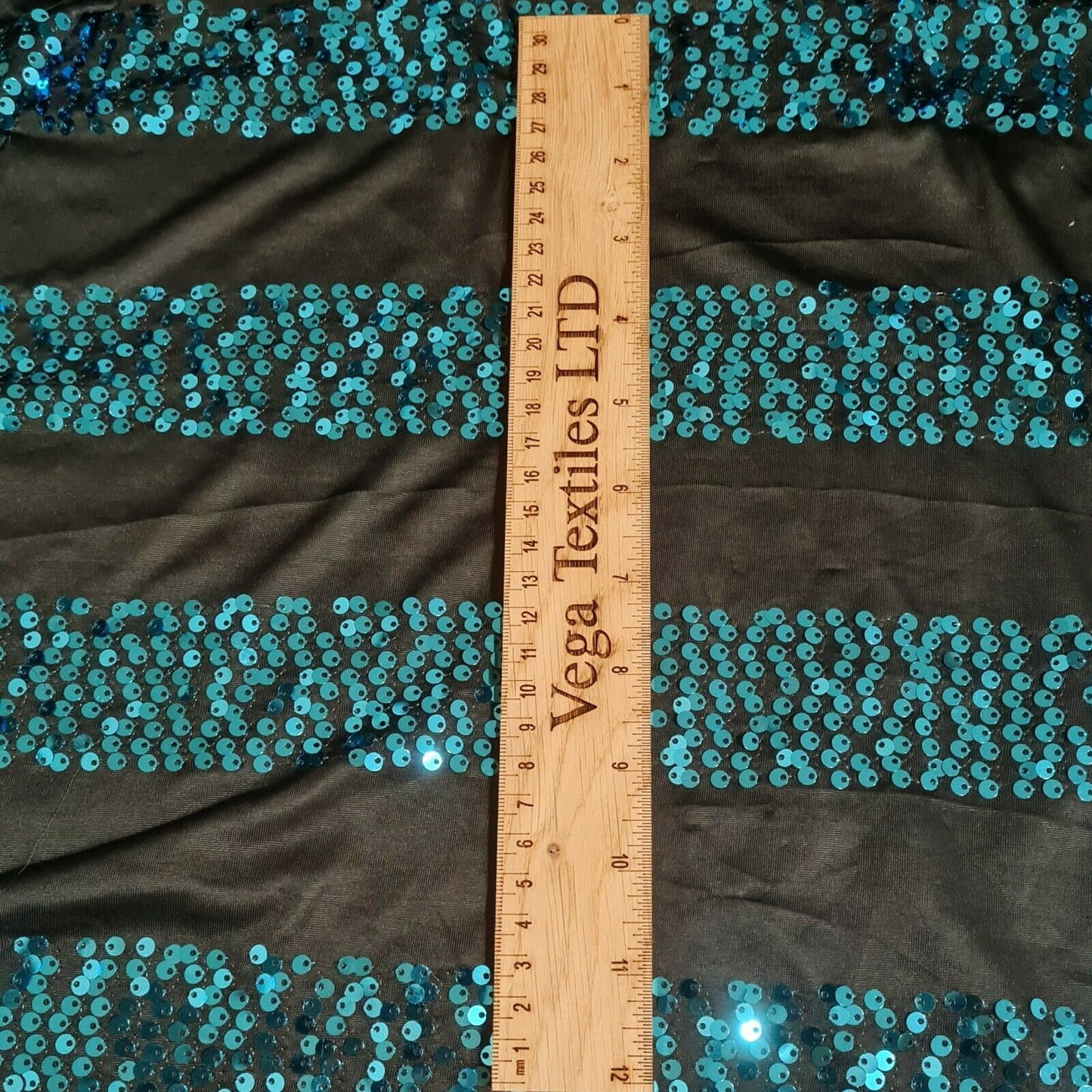 Jersey Fabric Blue Sequin Black Colour 55" Wide 2 Way Stretch