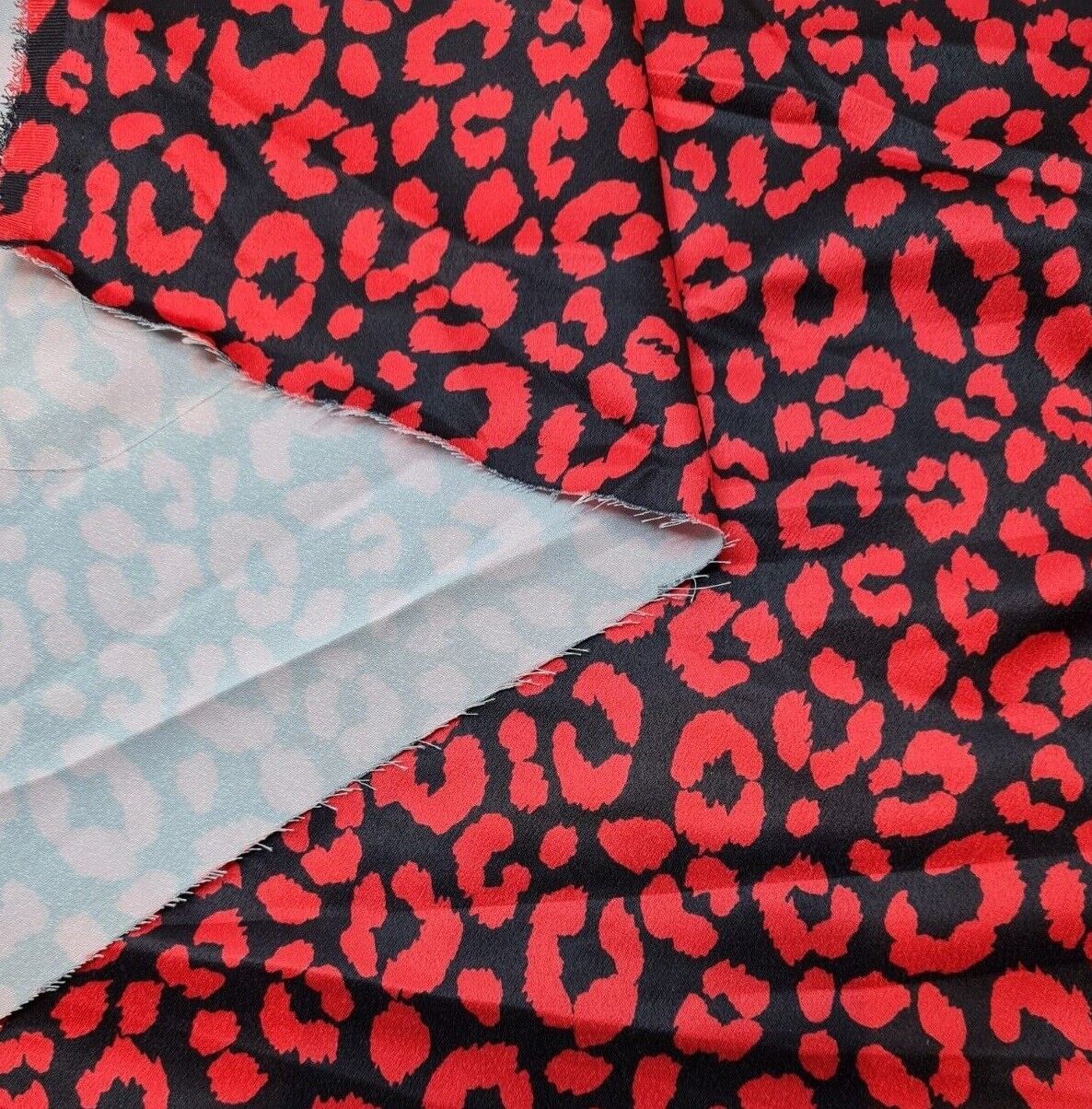 Satin Textured Dressmaking Fabric Red Animal Printed Black Colour 55" Wide