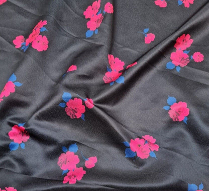 Satin Textured Dressmaking Fabric Fuchsia And Blue Floral Printed Black Colour