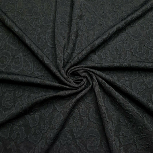 Dressmaking Knit Fabric Black Animal Figured 4 Way Stretch 55" Wide A1-211