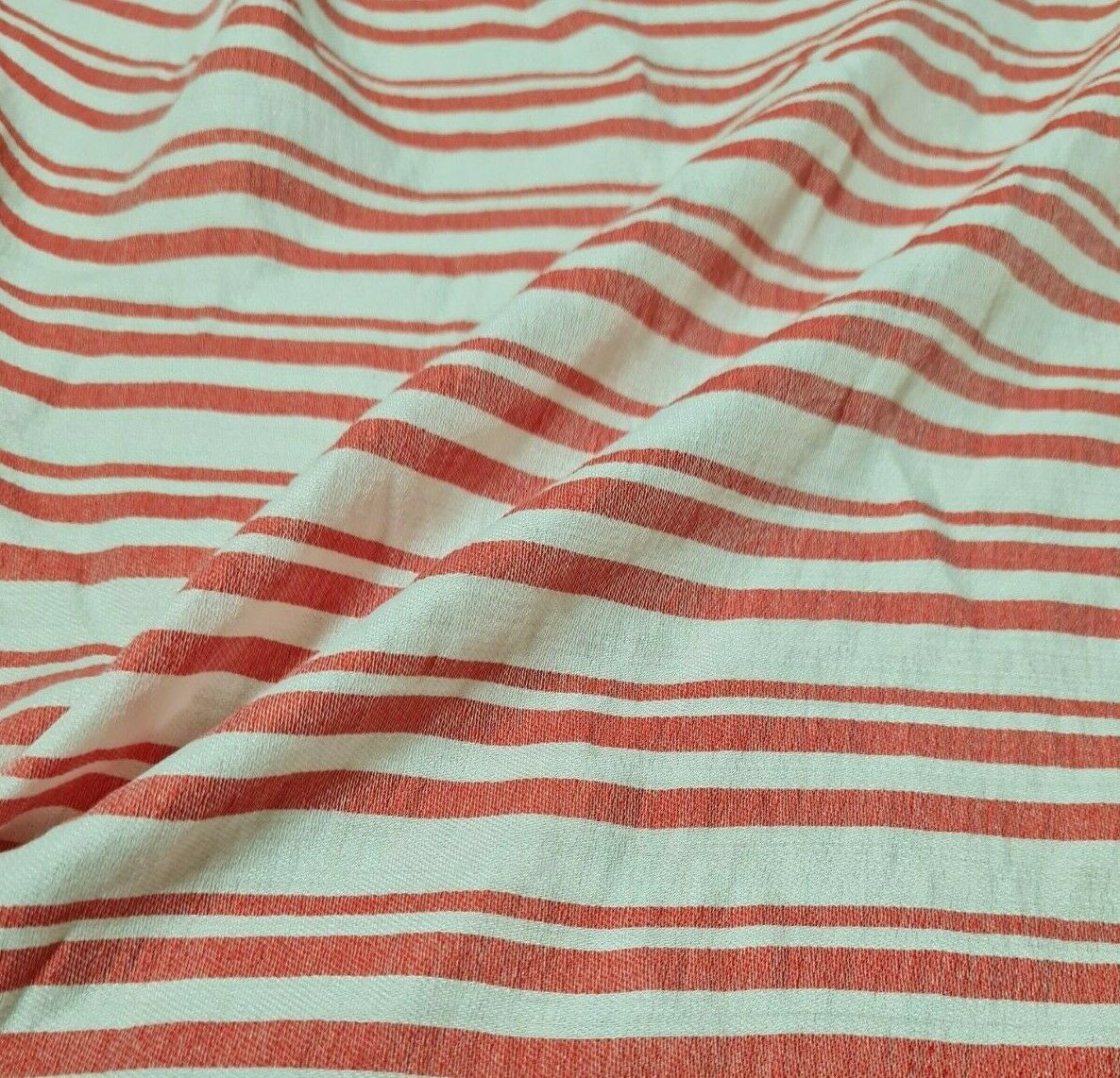 FABRIC RED AND OFF WHITE STRIPED THIN VISCOSE/POLYESTER -SOLD BY THE METRE