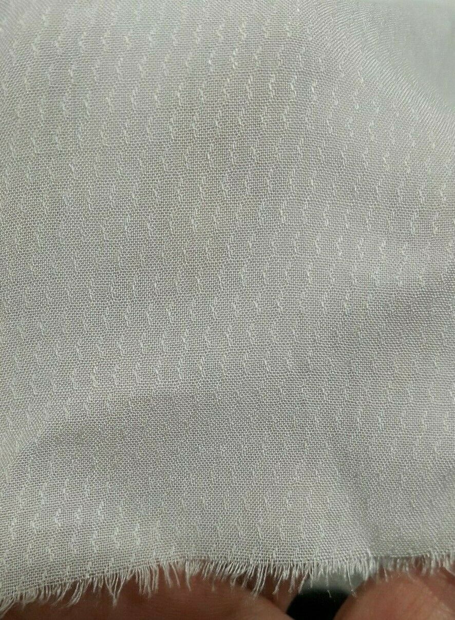 SMALL FIGURED THIN WHITE VISCOSE FABRIC - SOLD BY THE METRE