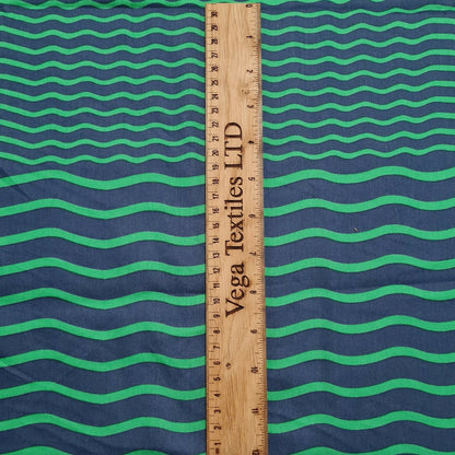 Cotton Sateen Fabric Green And Navy Colored Wavy Striped Printed Sold By Metre