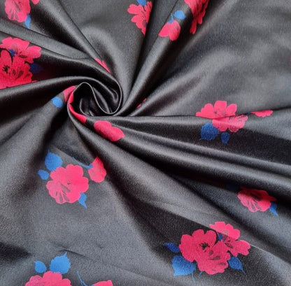 Satin Textured Dressmaking Fabric Fuchsia And Blue Floral Printed Black Colour