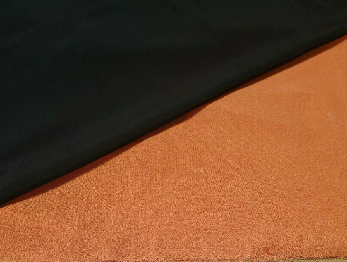 BLACK AND ORANGE COLOURS THIN VISCOSE FABRIC-SOLD BY THE METRE