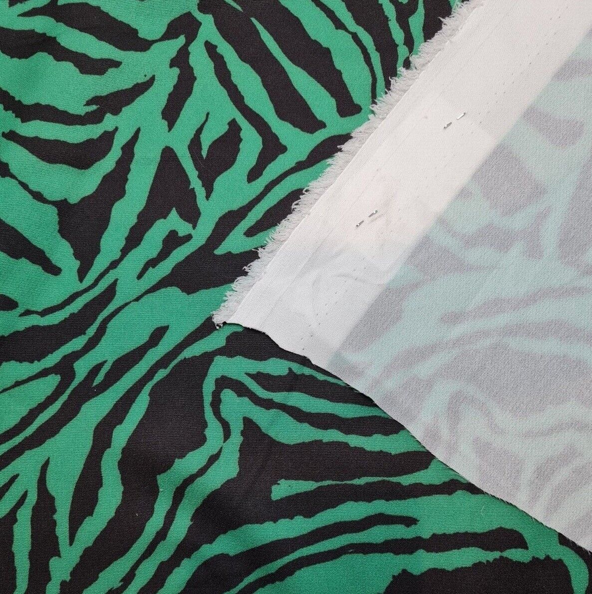 Dressmaking Fabric Green And Black Printed 55" Sold By Metre