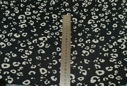 STRETCH NET TULLE FABRIC BLACK AND OFF WHITE LEOPARD PRINTED SOLD BY THE METRE