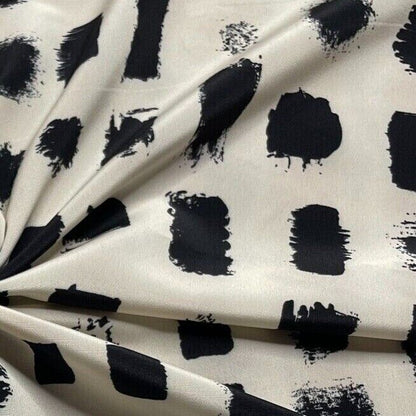 Crepe Fabric Black Printed Ivory Colour 55"