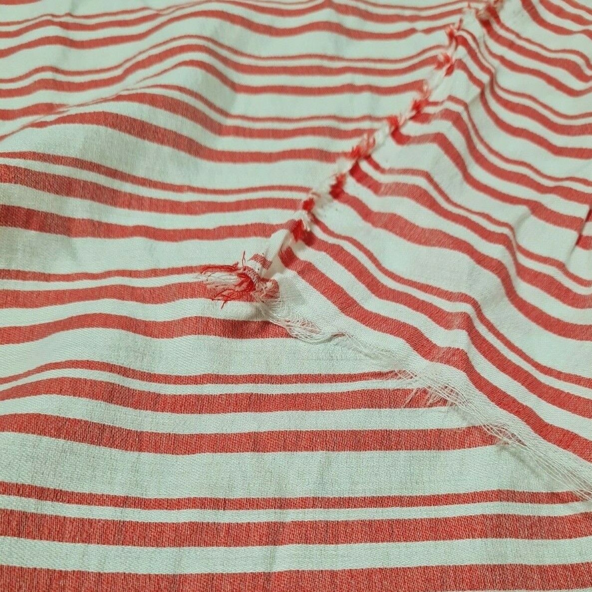 FABRIC RED AND OFF WHITE STRIPED THIN VISCOSE/POLYESTER -SOLD BY THE METRE