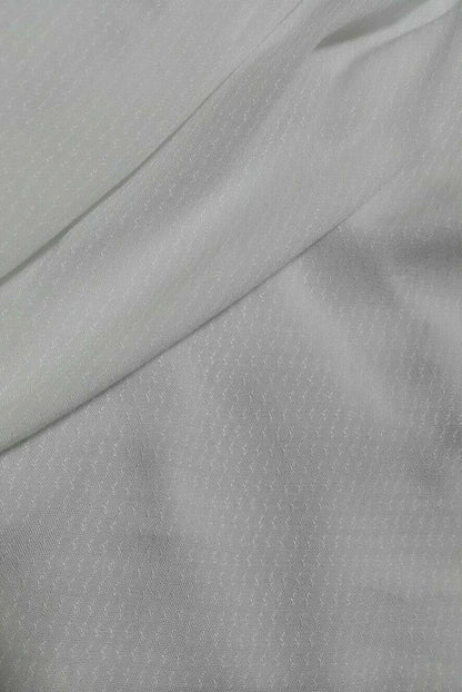 SMALL FIGURED THIN WHITE VISCOSE FABRIC - SOLD BY THE METRE