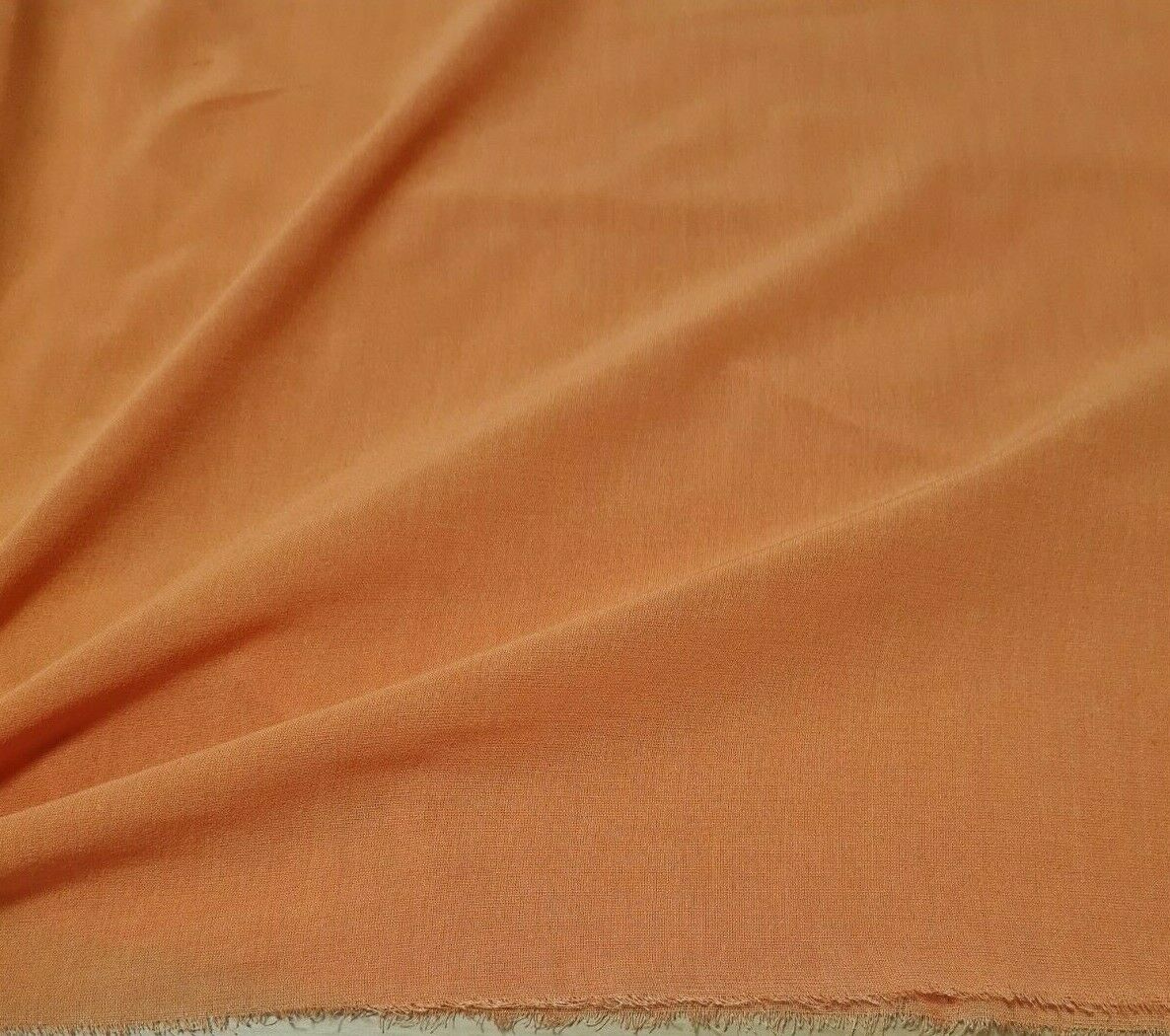 BLACK AND ORANGE COLOURS THIN VISCOSE FABRIC-SOLD BY THE METRE